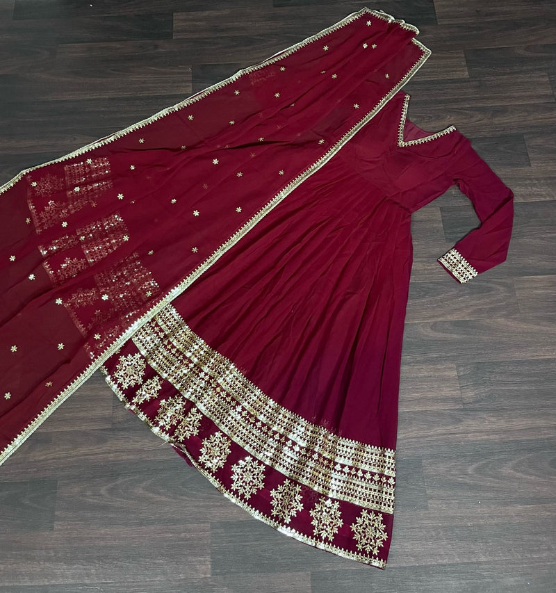 Elegant Maroon Faux Blooming Gown with Sequins Embroidered Dupatta – Graceful V Neck Design